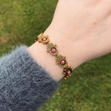 Gold Hamsa and Pink Bead Stretch Bracelet